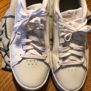Ladies  Size 9 M Puma white leather Sneaker gold accent